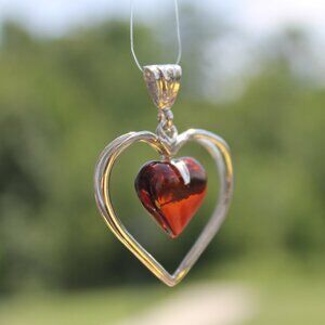 Jewelry Silver (Ag 925) pendant with Baltic Amber